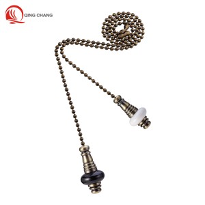 The combination of black and white ceramics and antique-brass iron ceiling fan pull chain