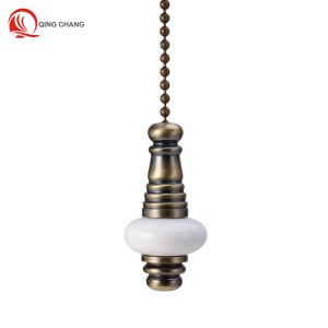 The combination of black and white ceramics and antique-brass iron ceiling fan pull chain