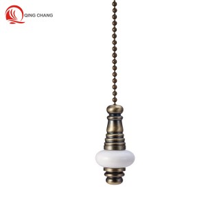 The combination of black and white ceramics and antique-brass iron ceiling fan pull chain